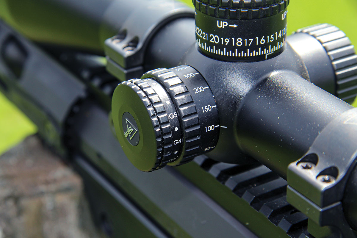 The parallax wheel is sandwiched inside the illumination wheel on the Tenmile HX 5-25x 50mm scope. The scope provides both red and green reticle lighting with five intensity levels each and off positions between each intensity.